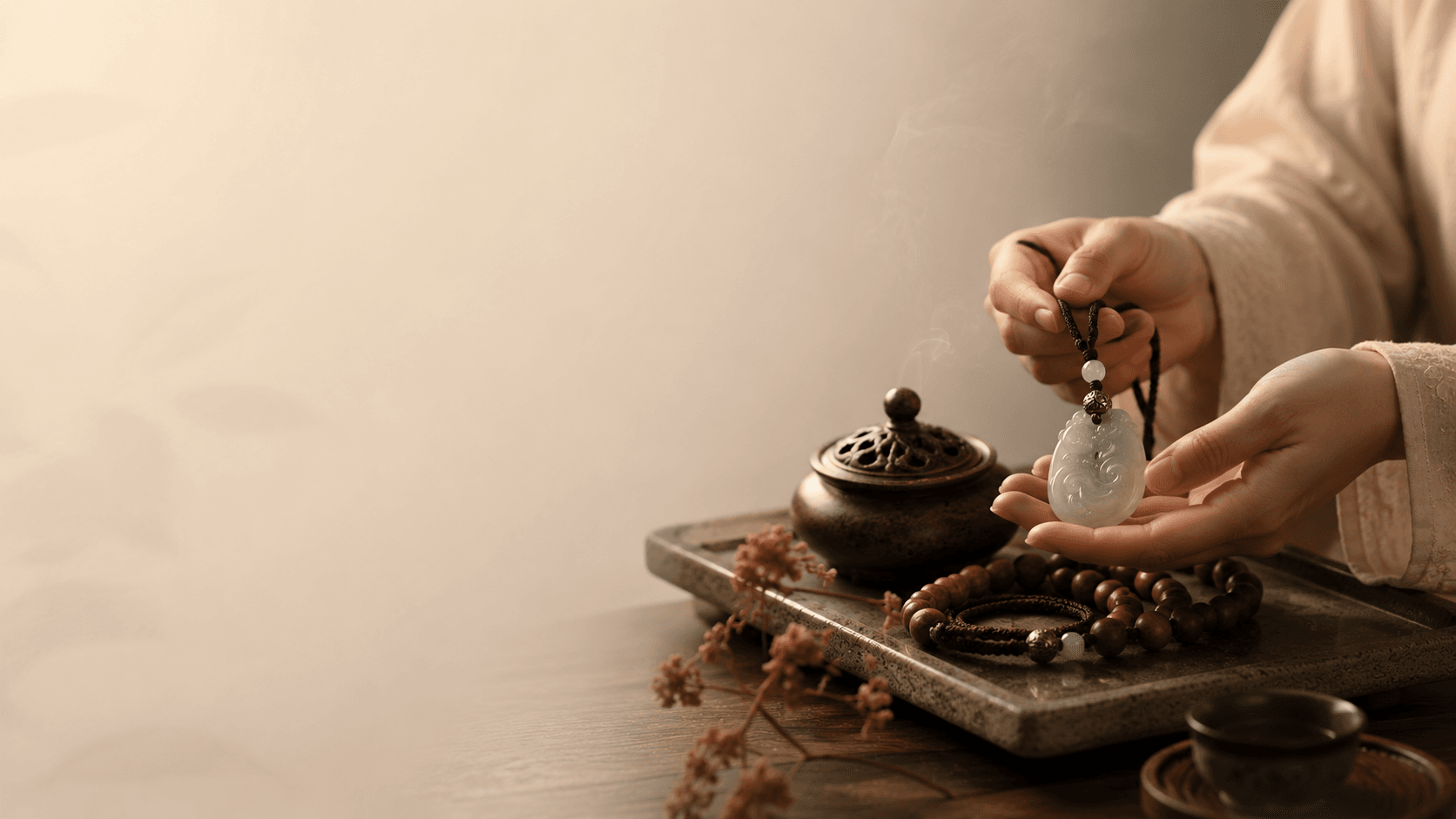 A quiet protective bracelet scene with wood beads and a jade-like pendant, representing safety, grounding, and steady support.